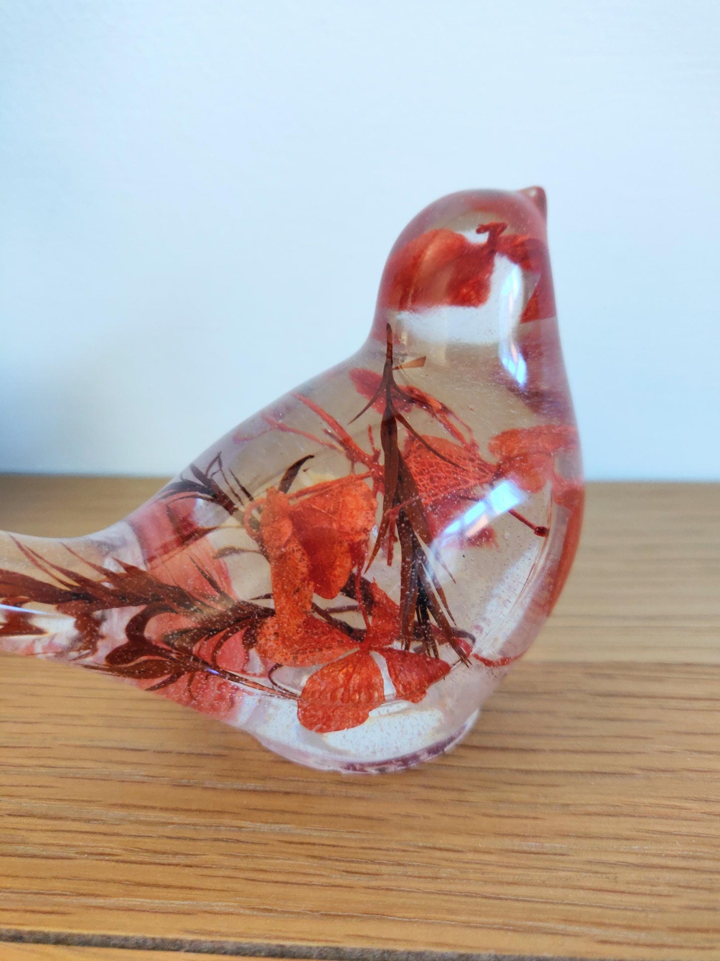 Resin Robin Ornament with Red Flowers, Shelf Sitter Decoration
