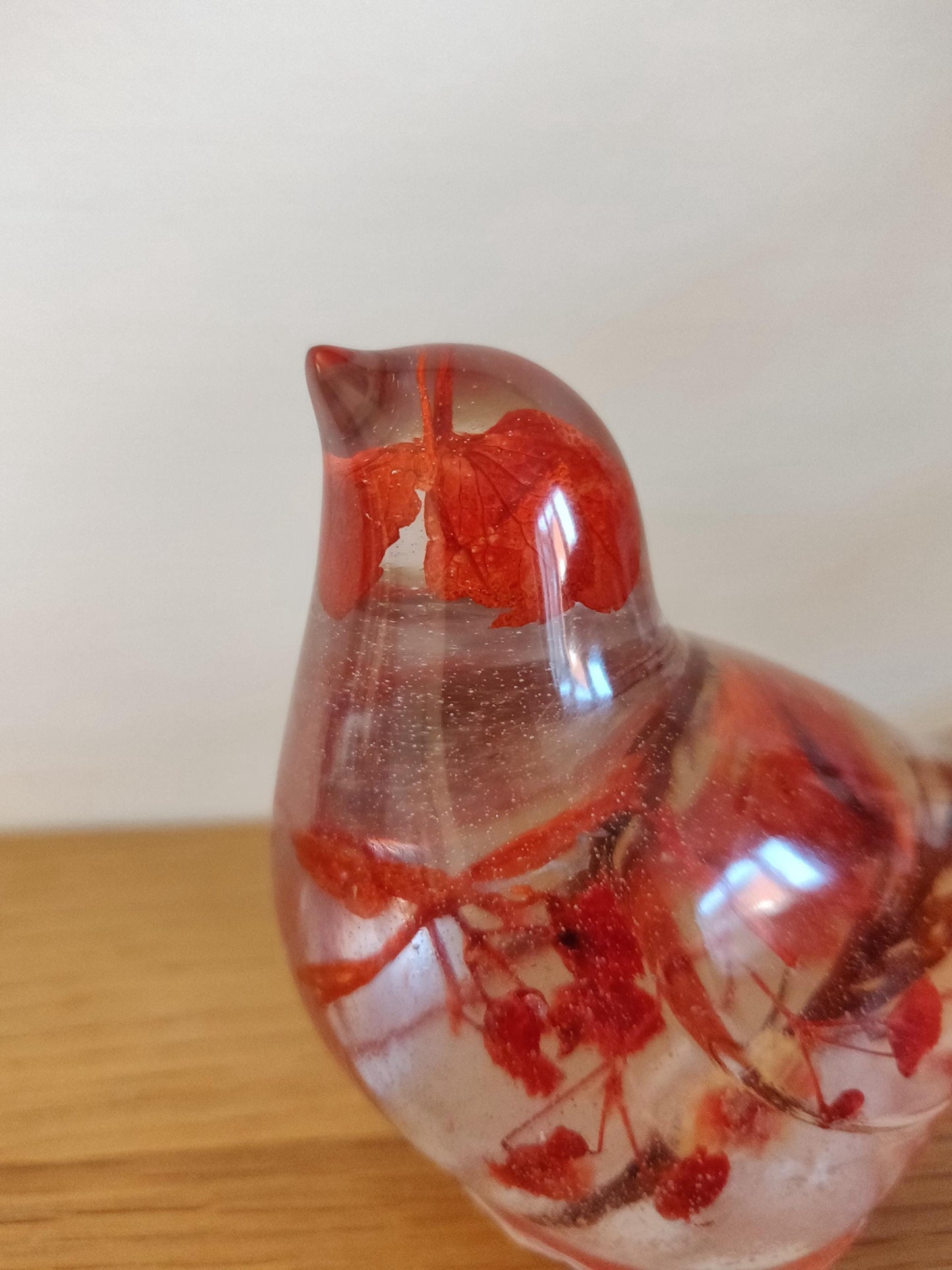 Resin Robin Ornament with Red Flowers, Shelf Sitter Decoration